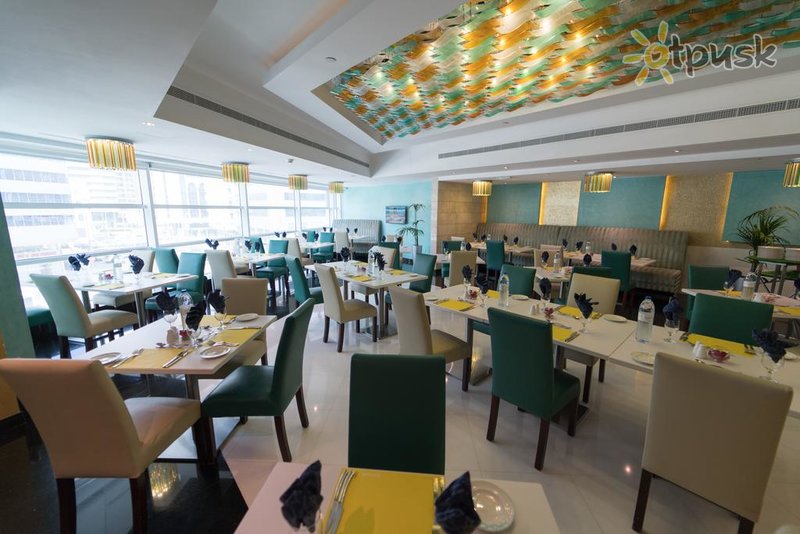 Фото отеля Golden Tulip Downtown Abu Dhabi 4* Абу Даби ОАЭ бары и рестораны