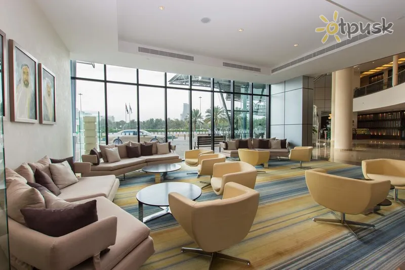 Фото отеля Holiday Inn Abu Dhabi 4* Abu Dabis JAE fojė ir interjeras