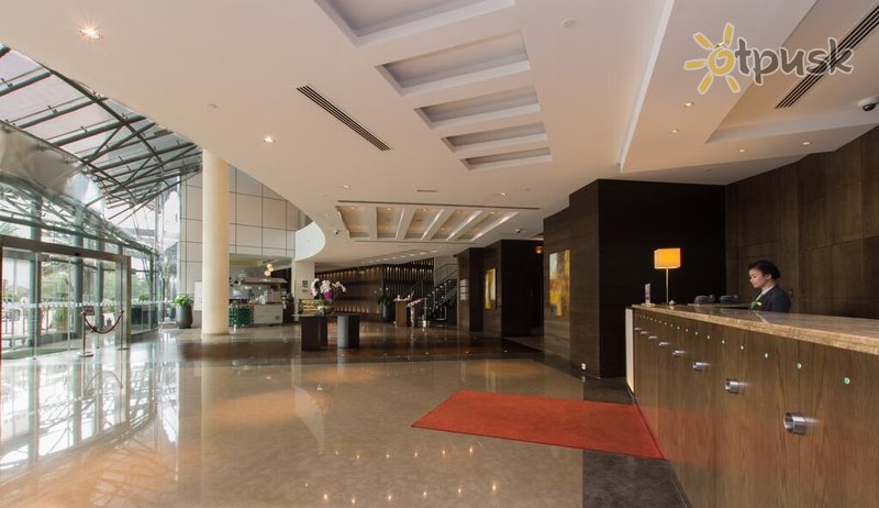 Фото отеля Holiday Inn Abu Dhabi 4* Абу Даби ОАЭ лобби и интерьер