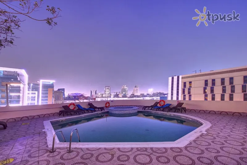 Фото отеля Howard Johnson Plaza by Wyndham Dubai Deira 4* Дубай ОАЕ екстер'єр та басейни