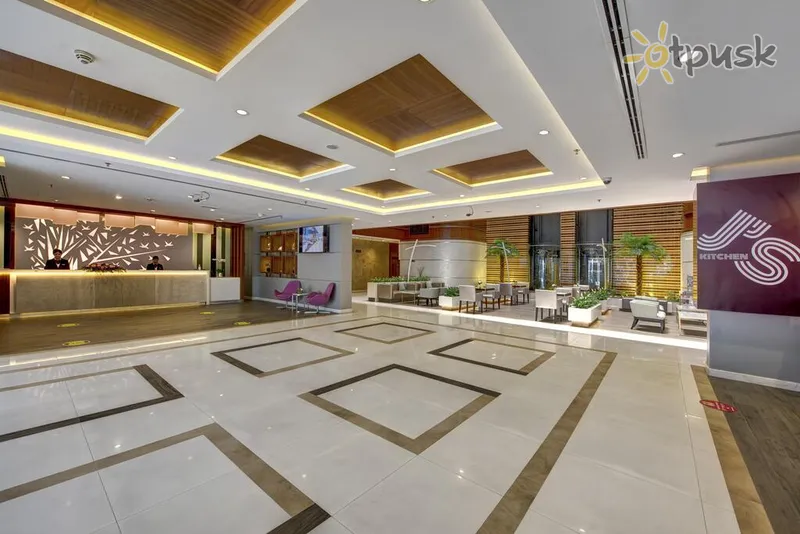 Фото отеля Howard Johnson Plaza by Wyndham Dubai Deira 4* Дубай ОАЭ лобби и интерьер