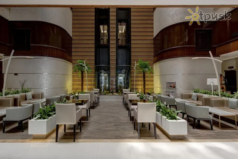 Фото отеля Howard Johnson Plaza by Wyndham Dubai Deira 4* Дубай ОАЭ лобби и интерьер