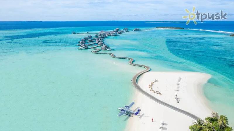 Фото отеля Soneva Fushi 5* Баа Атолл Мальдивы пляж