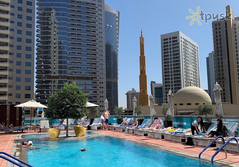 Фото отеля Tryp by Wyndham Dubai 4* Дубай ОАЭ экстерьер и бассейны