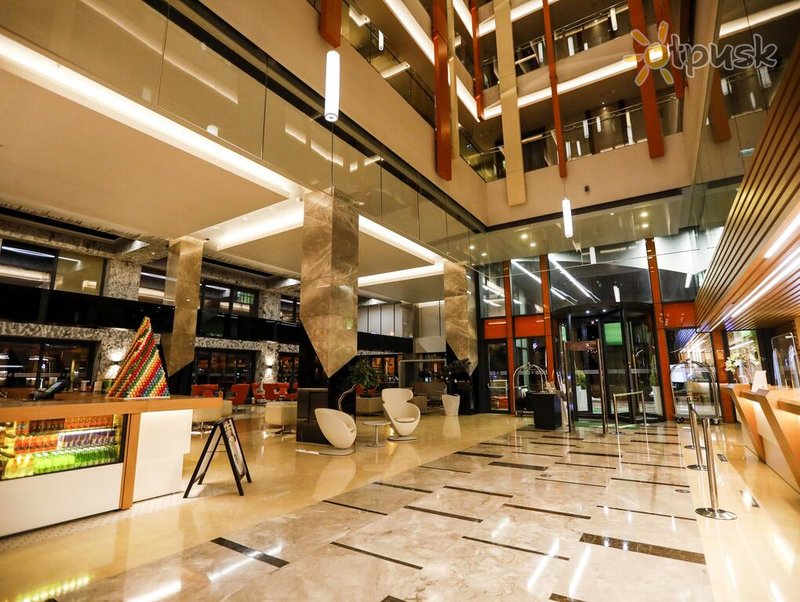 Фото отеля Holiday Inn Kayseri — Duvenonu 4* Эрджиес Турция лобби и интерьер