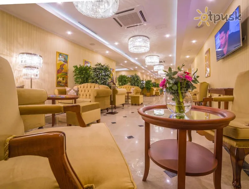 Фото отеля Ramada by Wyndham Almaty 4* Алматы Казахстан лобби и интерьер