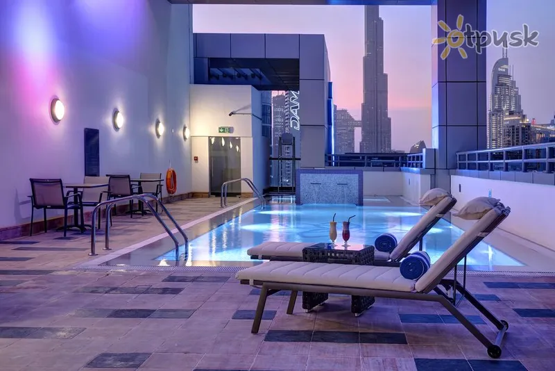 Фото отеля Royal Continental Suites 5* Дубай ОАЭ экстерьер и бассейны