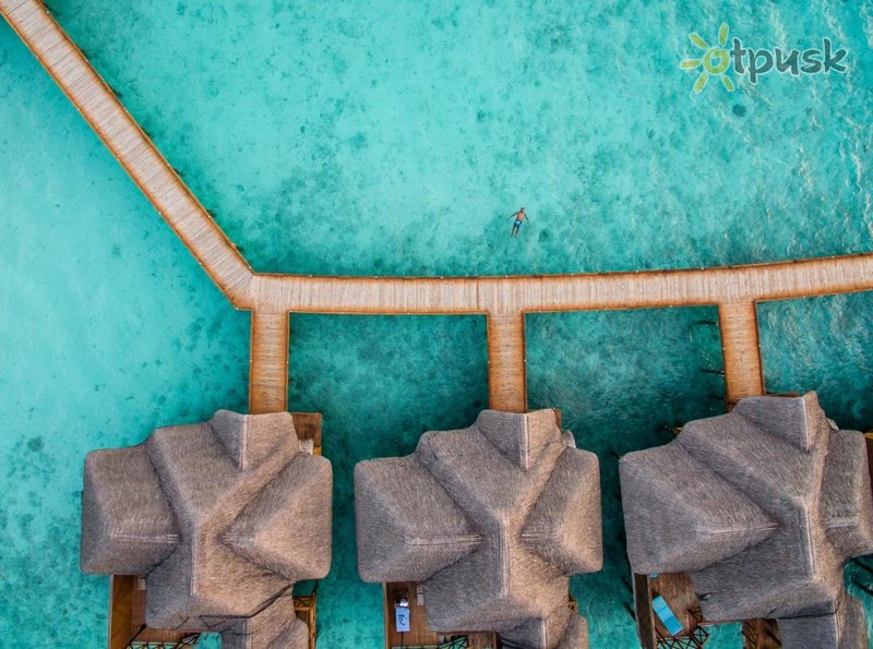 Фото отеля Fihalhohi Island Resort 4* Южный Мале Атолл Мальдивы пляж