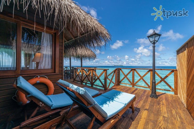 Фото отеля Fihalhohi Island Resort 4* Южный Мале Атолл Мальдивы номера