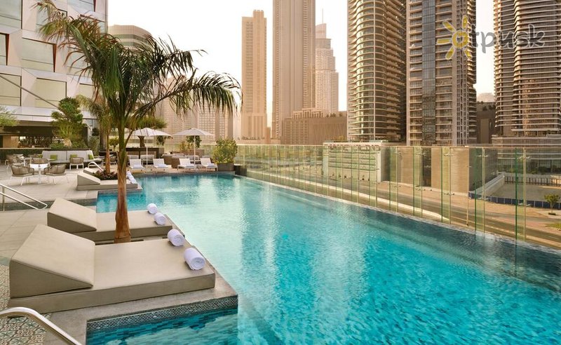 Фото отеля Indigo Downtown 4* Дубай ОАЭ экстерьер и бассейны