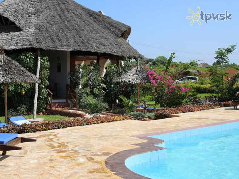Фото отеля Zanzibar Star Resort 3* Нунгви Танзания экстерьер и бассейны