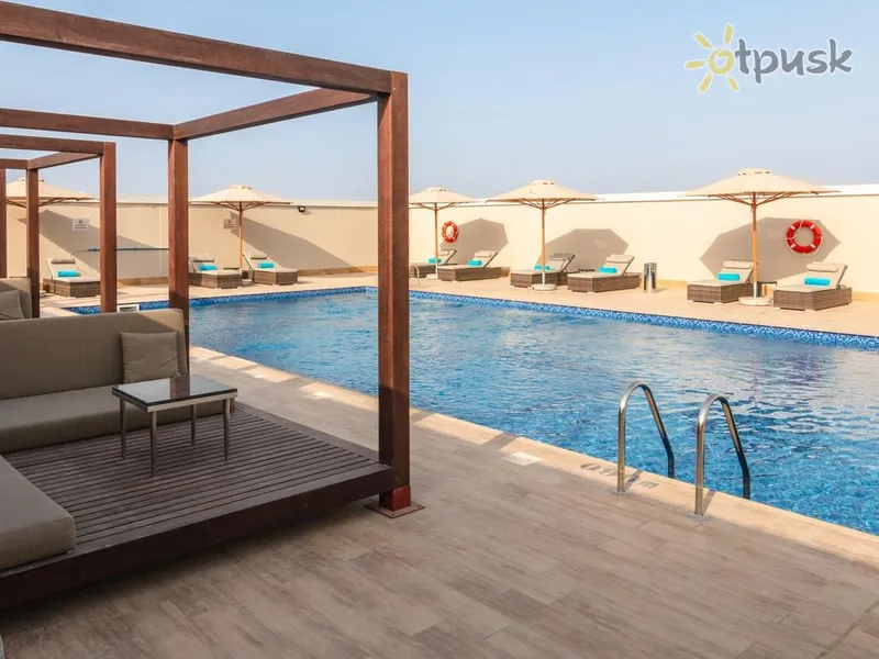 Фото отеля Flora Inn Hotel Dubai Airport 4* Дубай ОАЕ екстер'єр та басейни