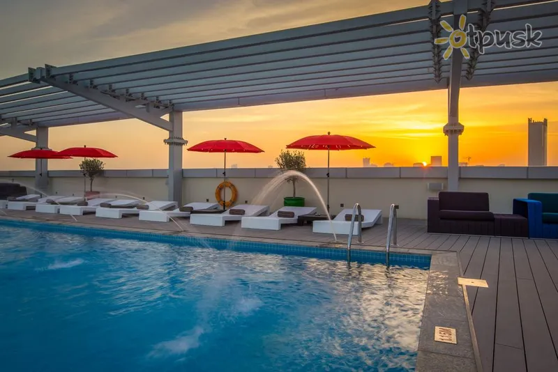 Фото отеля Park Inn by Radisson Dubai Motor City 4* Дубай ОАЕ екстер'єр та басейни