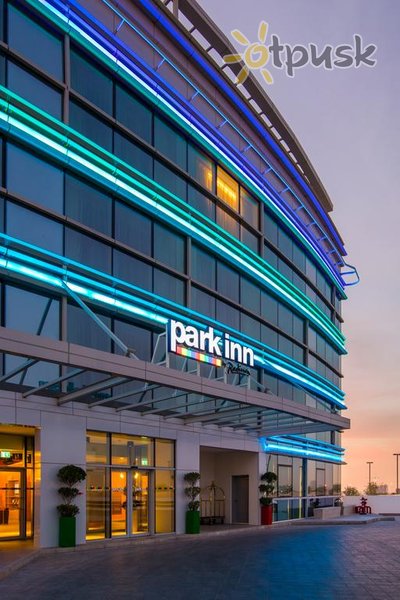 Фото отеля Park Inn by Radisson Dubai Motor City 4* Дубай ОАЭ экстерьер и бассейны