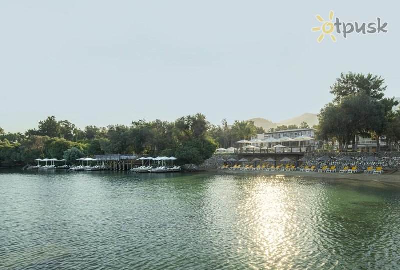 Фото отеля DoubleTree by Hilton Bodrum Isil Club Resort 5* Бодрум Турция пляж