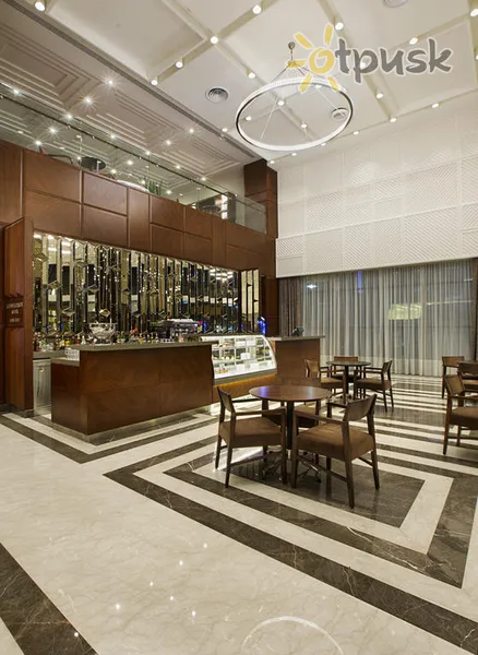 Фото отеля Doubletree by Hilton Istanbul Avcilar 5* Стамбул Турция лобби и интерьер
