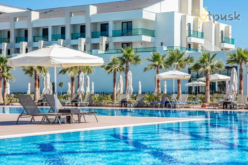Фото отеля Korumar Ephesus Beach & Spa Resort 5* Кушадаси Туреччина екстер'єр та басейни