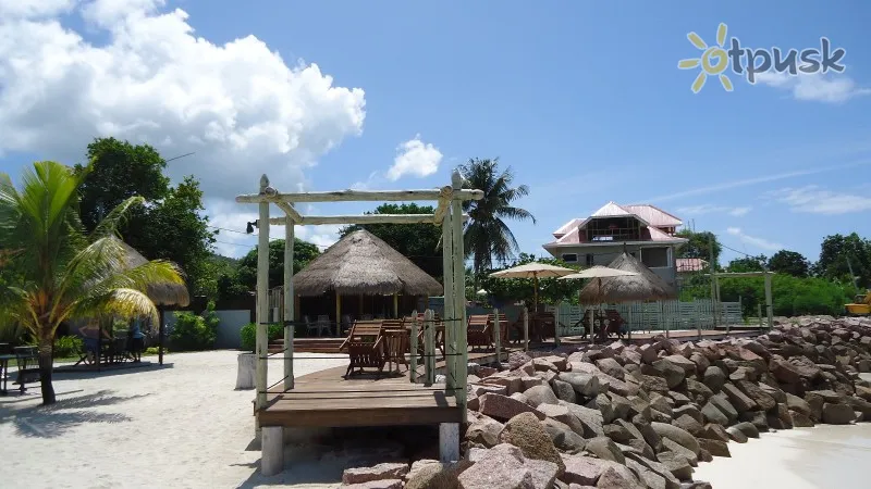 Фото отеля The Islanders Guest House 3* par. Praslin Seišelu salas ārpuse un baseini