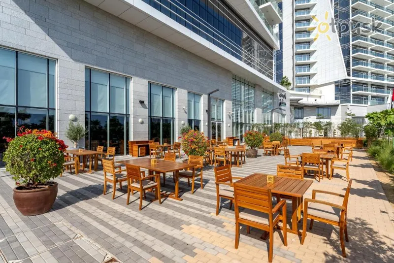 Фото отеля Radisson Dubai Damac Hills 5* Дубай ОАЭ бары и рестораны