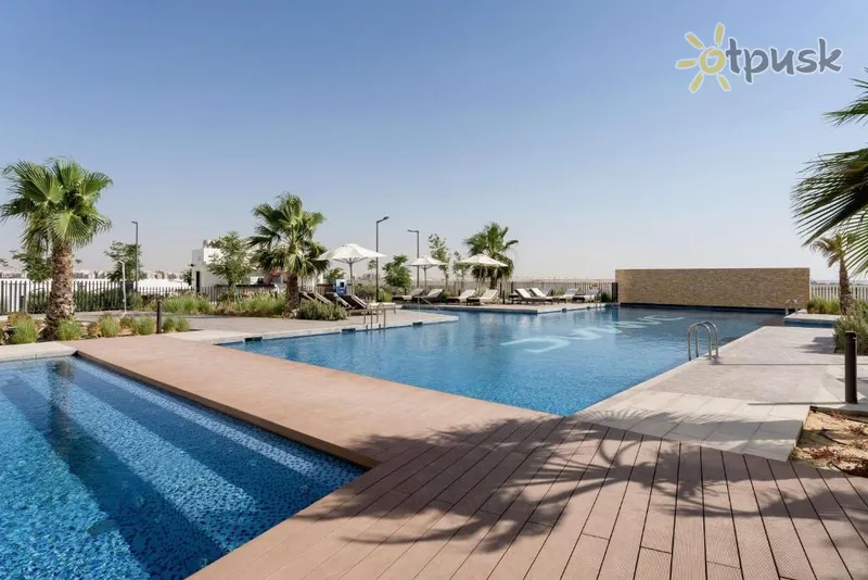 Фото отеля Radisson Dubai Damac Hills 5* Дубай ОАЭ экстерьер и бассейны