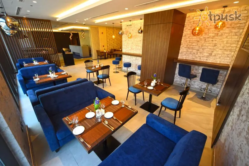 Фото отеля Kingsgate Canal Hotel 3* Dubajus JAE barai ir restoranai