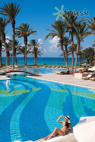 Фото отеля Constantinou Bros Asimina Suites Hotel 5* Пафос Кипр экстерьер и бассейны