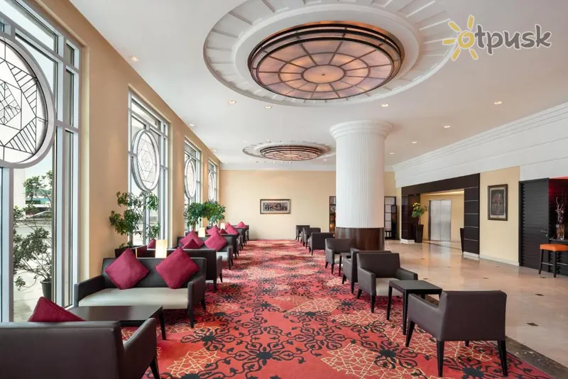 Фото отеля Ramada Plaza by Wyndham Dubai Deira 4* Дубай ОАЭ лобби и интерьер