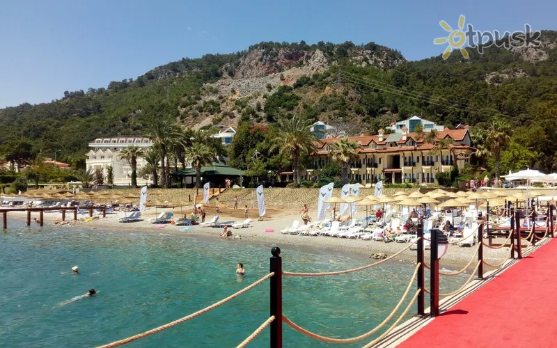 Фото отеля Dosinia Luxury Resort 5* Кемер Туреччина пляж