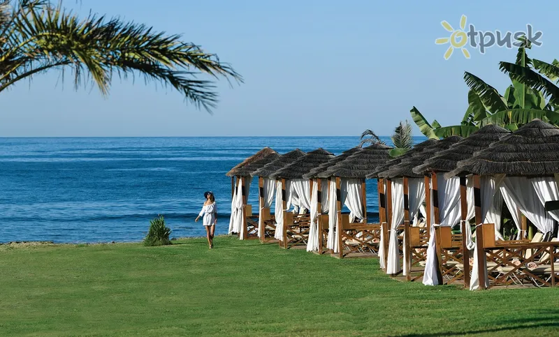 Фото отеля Constantinou Bros Athena Royal Beach Hotel 4* Пафос Кипр пляж