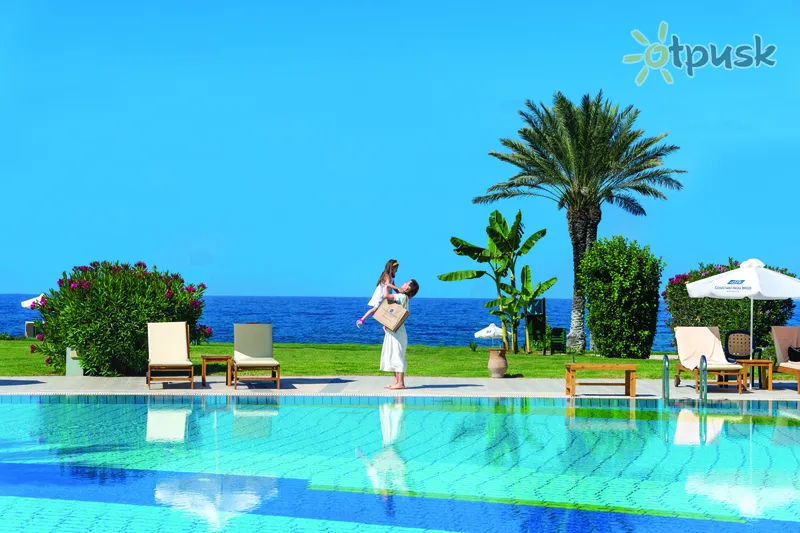 Фото отеля Constantinou Bros Athena Beach Hotel 4* Patosas Kipras išorė ir baseinai