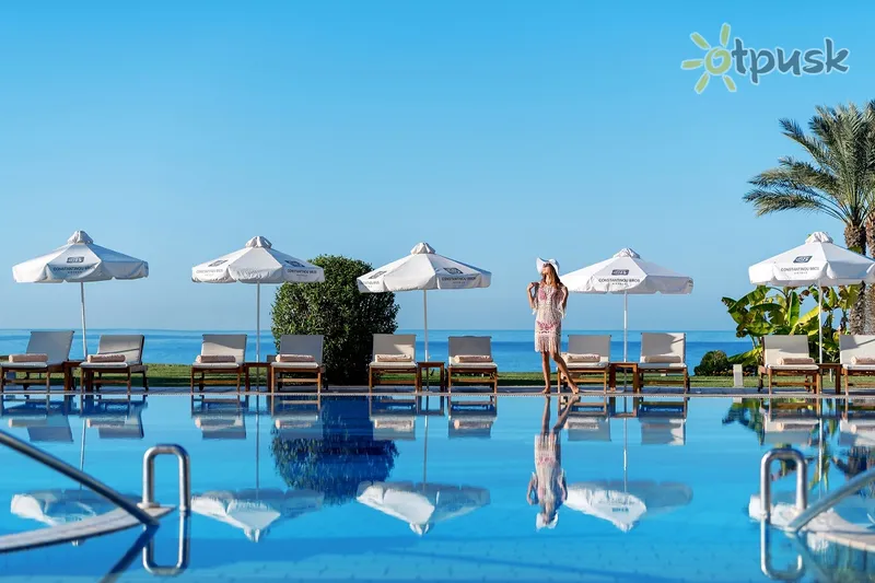 Фото отеля Constantinou Bros Athena Beach Hotel 4* Patosas Kipras išorė ir baseinai