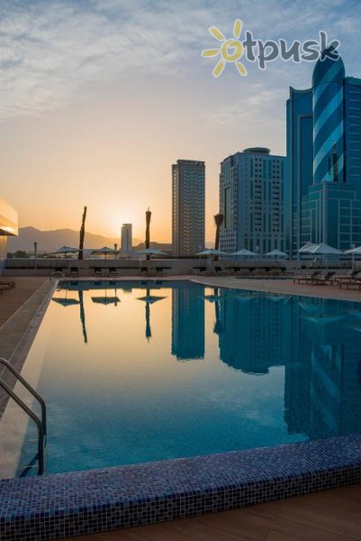 Фото отеля Adagio Fujairah Aparthotel 4* Фуджейра ОАЭ экстерьер и бассейны