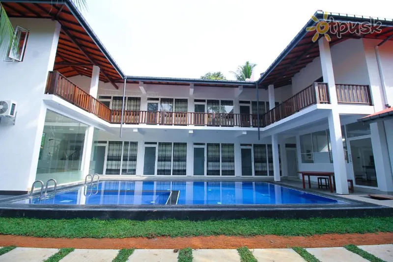 Фото отеля Hikka Villa Ritas 3* Хіккадува Шрі Ланка екстер'єр та басейни