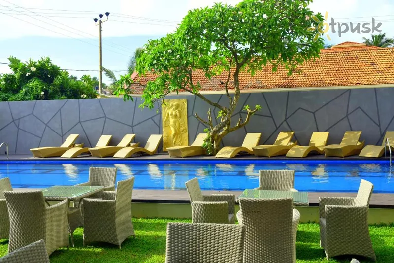Фото отеля Ruvisha Beach Hotel 4* Негомбо Шрі Ланка екстер'єр та басейни