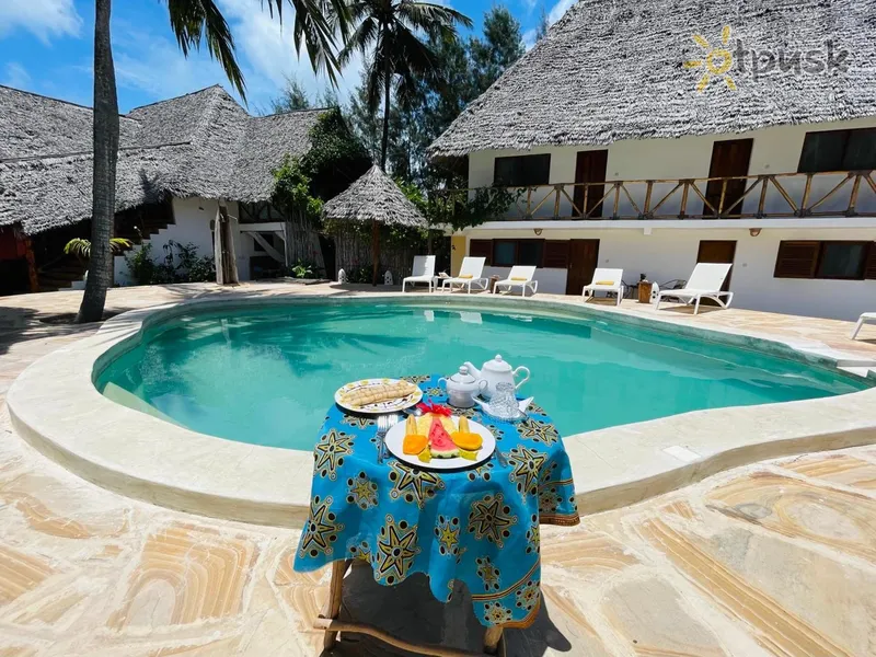 Фото отеля Oleza Boutique Hotel Zanzibar 3* Мичамви Танзания экстерьер и бассейны