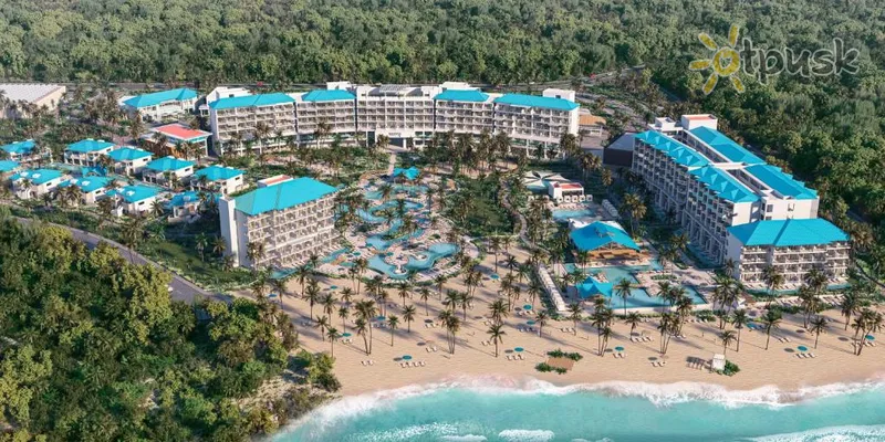 Фото отеля Margaritaville Island Reserve Cap Cana Wave 5* Cap Cana Dominikānas republika pludmale