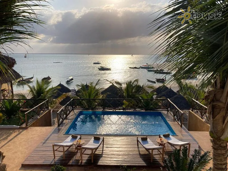 Фото отеля Almasi Beach Resort Kendwa 4* Kendva Tanzānija ārpuse un baseini