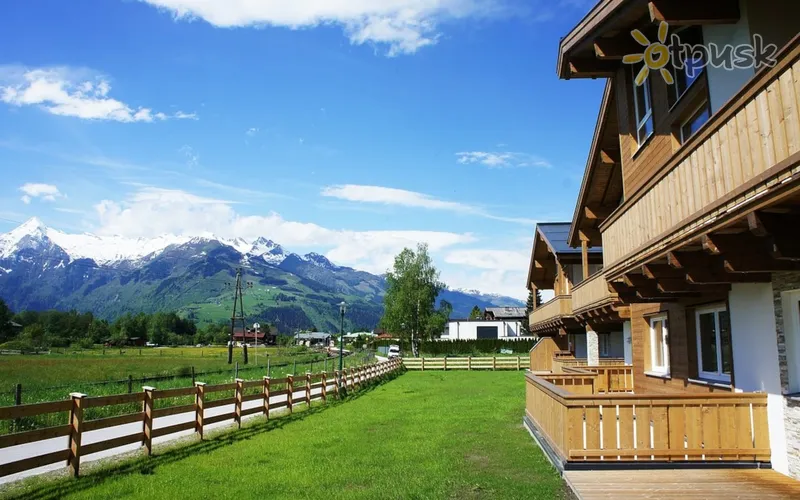 Фото отеля Alpenparks Schuttdorf Apartment 3* Cellamzē Austrija ārpuse un baseini