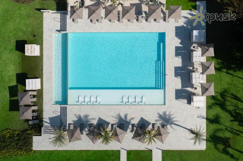 Фото отеля AC Hotel By Marriott Punta Cana 4* Punta Cana Dominikānas republika ārpuse un baseini