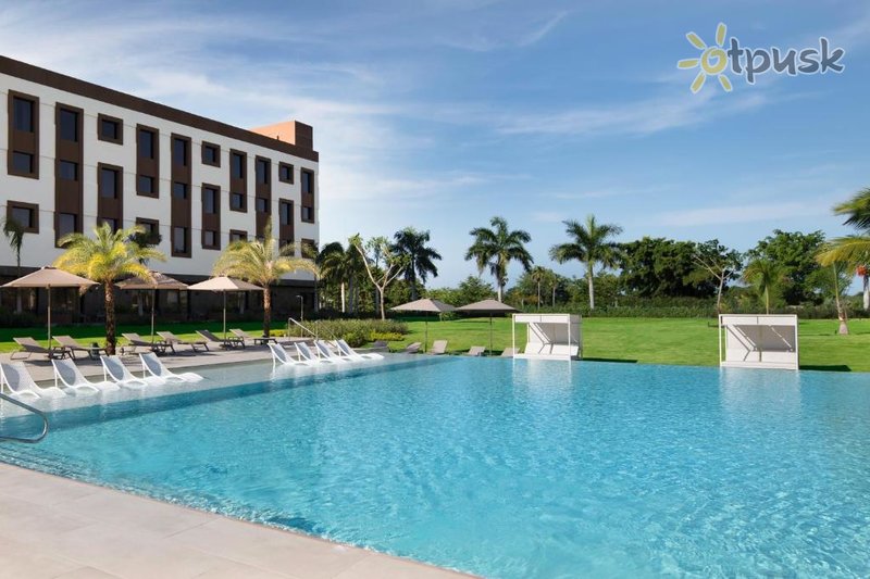 Фото отеля AC Hotel By Marriott Punta Cana 4* Punta Cana Dominikānas republika экстерьер и бассейны