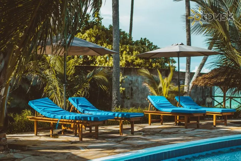 Фото отеля Sunny Palms Beach Bungalows 4* Уроа Танзания экстерьер и бассейны