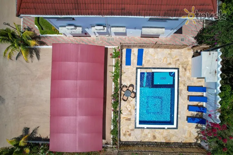Фото отеля Sunny Palms Beach Bungalows 4* Уроа Танзанія екстер'єр та басейни