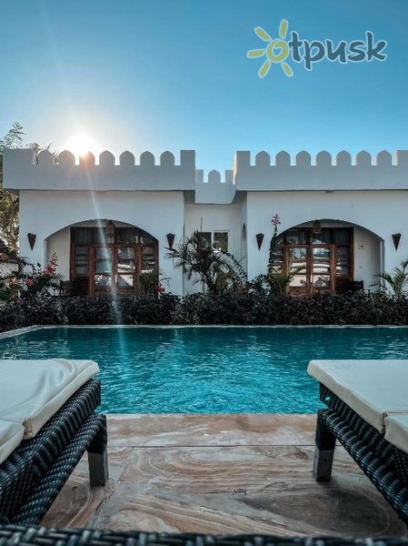Фото отеля The Golden Blue Luxury Hotel 4* Бведжу Танзания экстерьер и бассейны