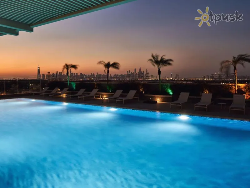 Фото отеля Movenpick Jumeirah Village Triangle 5* Дубай ОАЭ экстерьер и бассейны