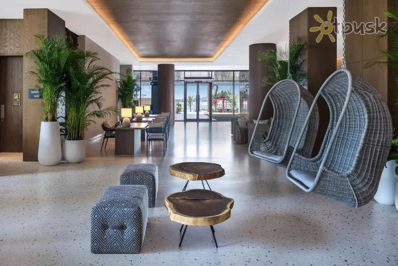 Фото отеля Radisson Beach Resort Palm Jumeirah 4* Dubaija AAE vestibils un interjers