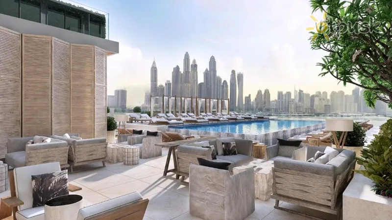 Фото отеля Radisson Beach Resort Palm Jumeirah 4* Дубай ОАЭ экстерьер и бассейны