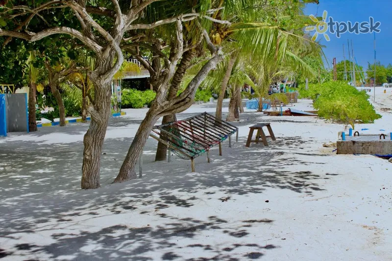Фото отеля WhiteShell Beach Inn 3* Південний Мале Атол Мальдіви пляж