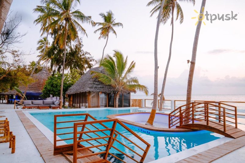 Фото отеля Tiki Beach Club & Resort 4* Паже Танзания экстерьер и бассейны