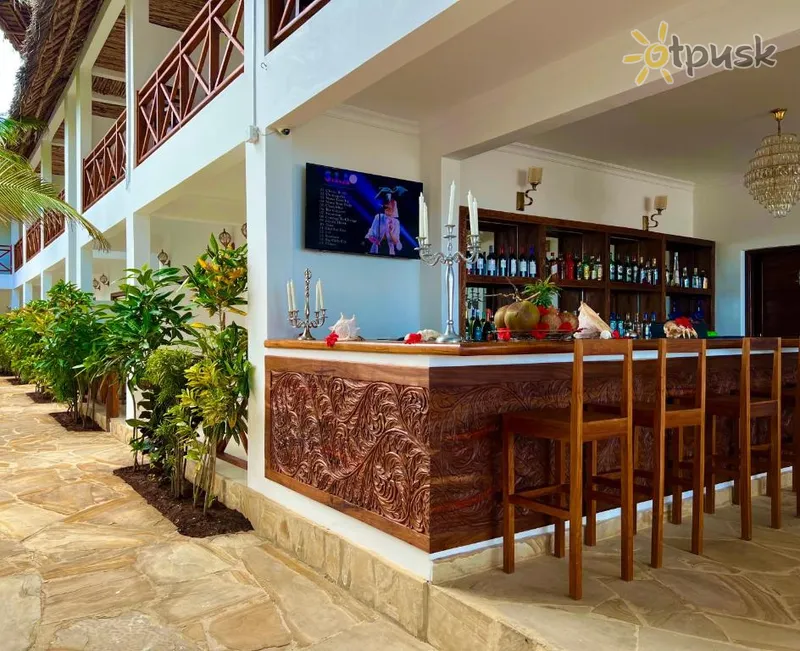 Фото отеля Karibu Beach Resort 4* Понгве Танзания экстерьер и бассейны