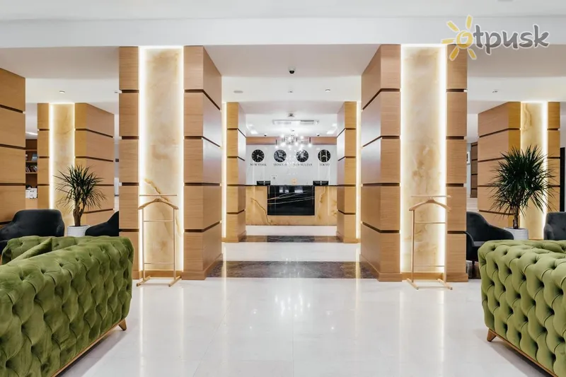 Фото отеля Ramada by Wyndham Astana 4* Астана Казахстан лобі та інтер'єр